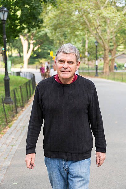 istock Retired Senior Man at Park, Walking and Relaxing, Smiling Expression 533417825