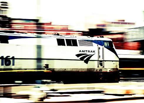 Kansas City, Missouri, USA - December 19th, 2014: A moving Amtrak Passenger Train pulling into Union Station.