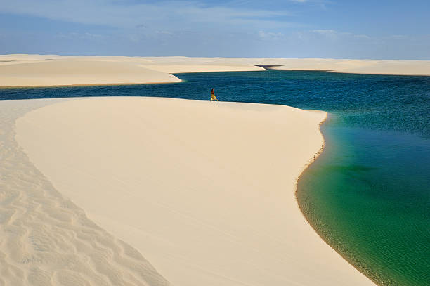 Lencois Maranhenses National Park, Brazil Lencois, Maranhao, Brazil - August 21, 2010: Lencois Maranhenses National Park, located in northeastern Brazil, low, flat, occasionally flooded land, overlaid with large, discrete sand dunes with blue and green lagoons brazil desert maranhao state national park stock pictures, royalty-free photos & images