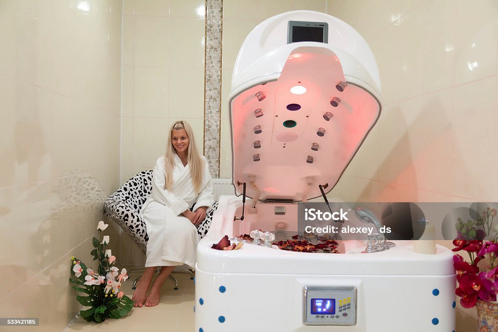 Woman sits waiting for Vichy Bath is ready 20-24 Years Stock Photo