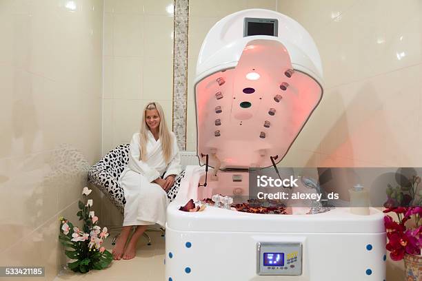 Woman Sits Waiting For Vichy Bath Is Ready Stock Photo - Download Image Now - 20-24 Years, 2015, Adult
