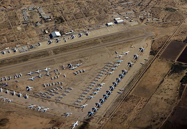Aircraft boneyard commercial jets parked in the desert stock photo
