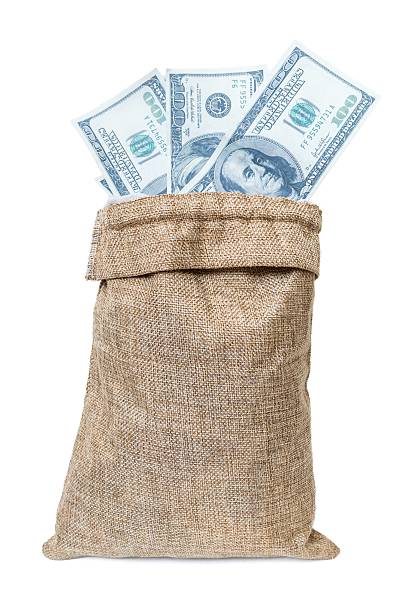 istock Bag with money isolated on white background. 533429324