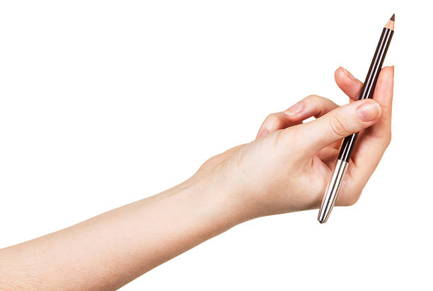 istock Eyebrow Pencil in  female hand isolated on white background 533433770