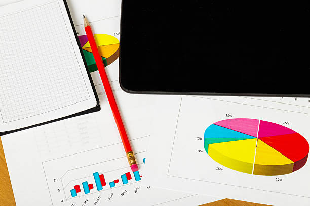istock Flatbed, notebook and pencil on the background of  desktop 533434398