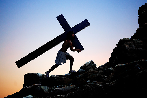 Jesus carrying the cross.