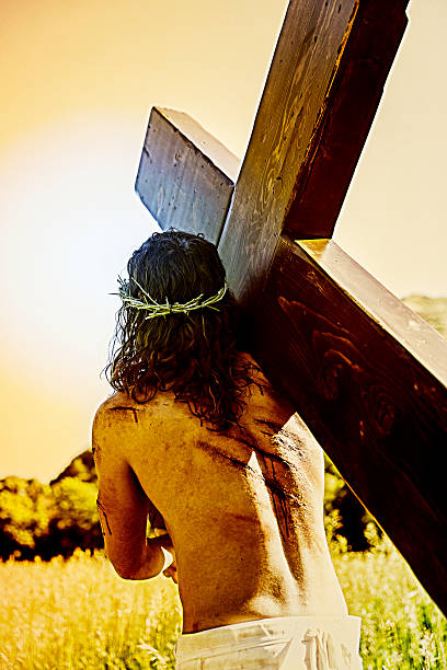 Jesus carrying the cross. stock photo