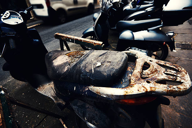 horizontal shot of burned motocycle in the city, vandalism concept.