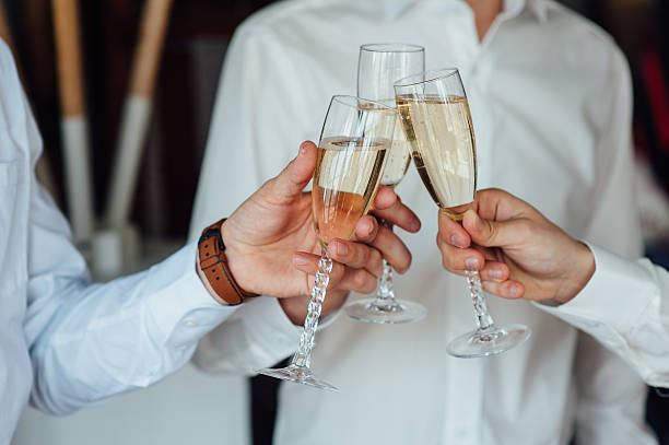 istock three Successful businessman toasting Champagne 533439860