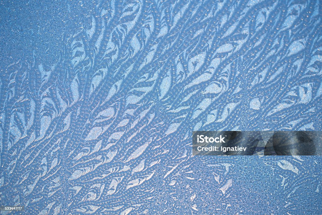 Frosty pattern Original pattern at a winter window. 2015 Stock Photo