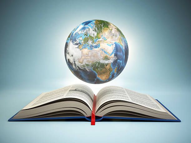 istock Opened book and Earth on blue background, Education concept. 533441522