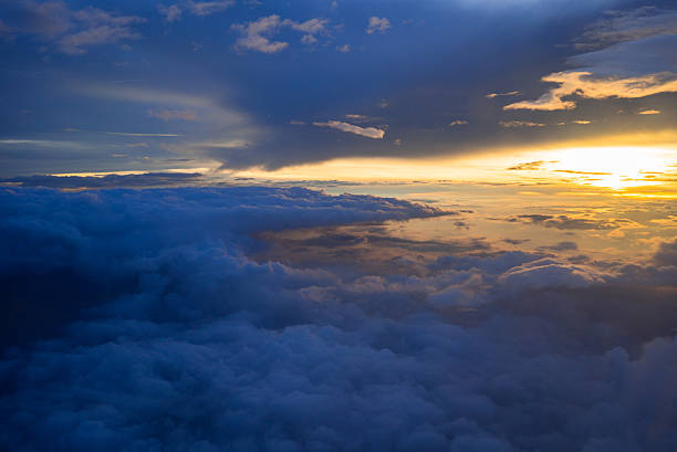 istock Clouds and sky as seen through window of an aircraft 533441530