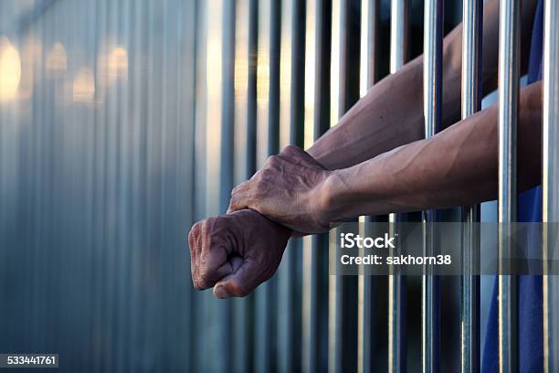 Hand In Jail Stock Photo - Download Image Now - Criminal, Prison, Law
