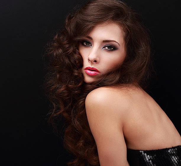 istock Beautiful woman with smokey eyes bright makeup 533442501
