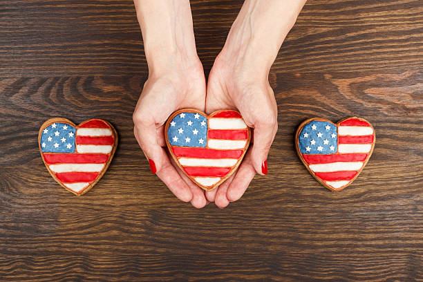 istock Cookie with American patriotic colors in the hands 533442736