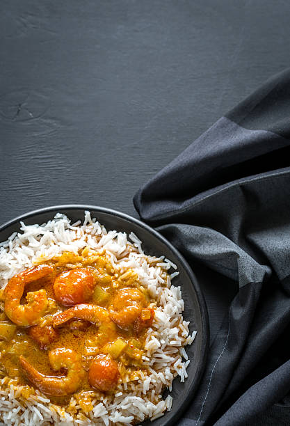 istock Thai yellow curry with seafood and white rice 533443118