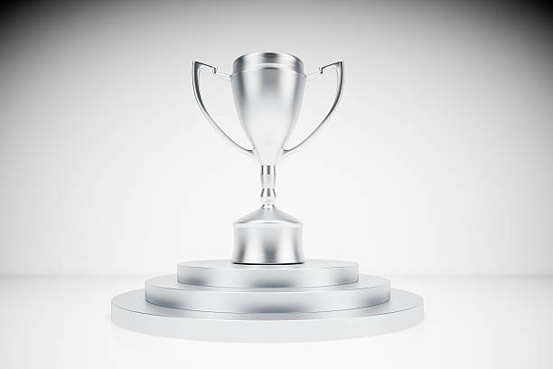 istock silver trophy on podium with isolated background 533443323