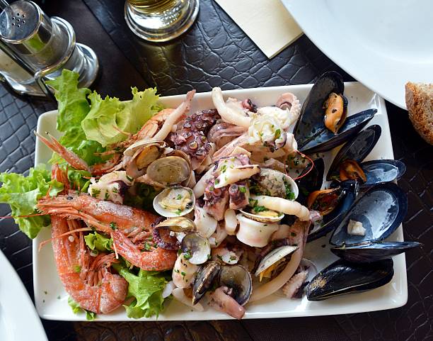 istock Fresh seafood cocktail on a white bowl 533443342