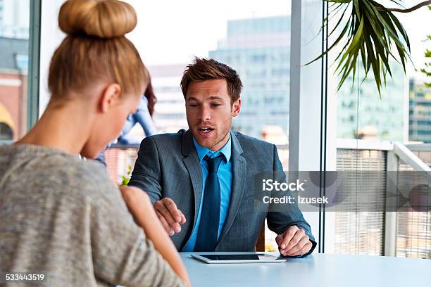 Manager Talking With His Business Partner Stock Photo - Download Image Now - Business, Discussion, Talking