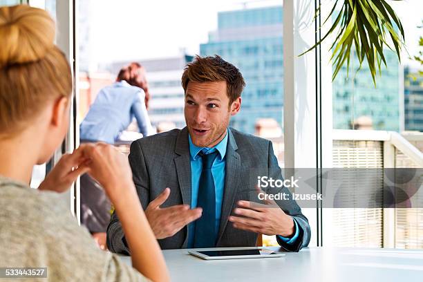 Manager Talking With His Business Partner Stock Photo - Download Image Now - 2015, Adult, Agreement