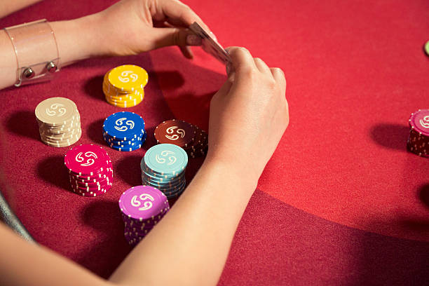 istock people at the casino playing poker 533443661