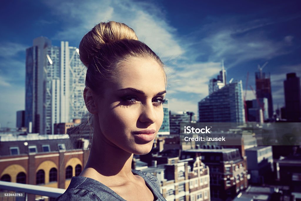 Successful businesswoman, Outdoor Portrait Outdoor portrait of confident businesswoman with city scape in the background. Beautiful Woman Stock Photo