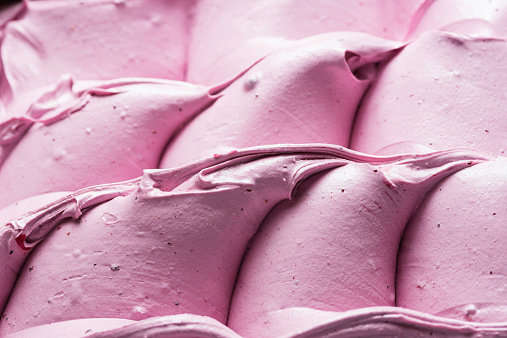 Close up of pink surface a blueberry Ice cream.