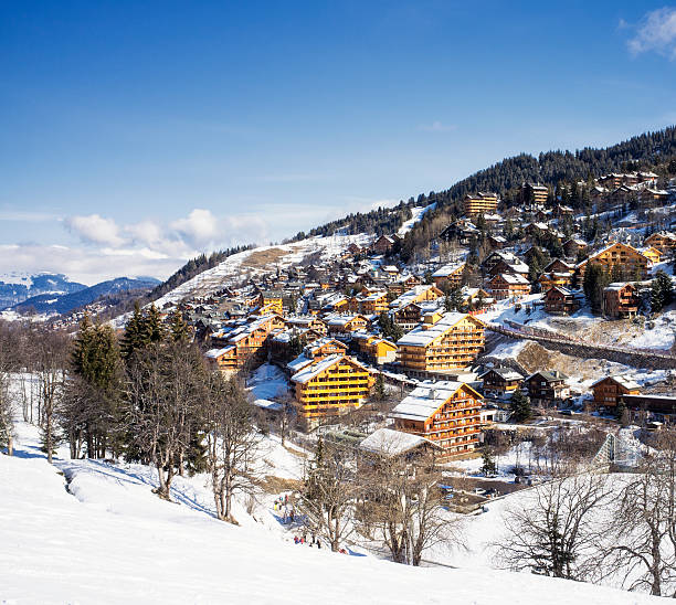 Traditional chalets and apartment at the ski resort of Meribel, part of the Trois Vallees ski area in the French Alps.