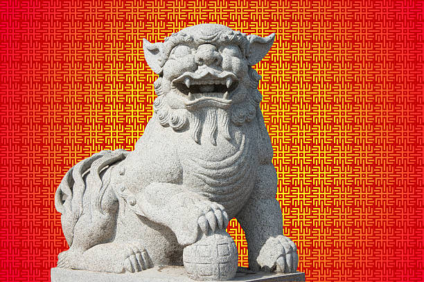 istock Stone lion statue in a Chinese temple with pattern 533445935