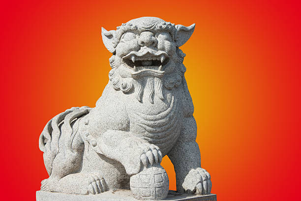 istock Stone lion statue in a Chinese temple with pattern 533445937