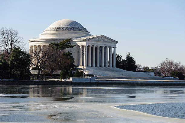 The young boys stare up in awe at the giant statue of Thomas Jefferson in Washington DC.