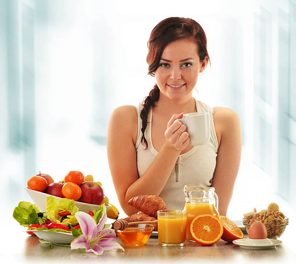 Young woman having breakfast. Balanced diet