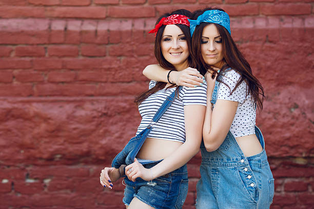 istock young twins girls, hugging 533447908