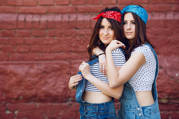 istock Happy young twins girls hugging. 533449746