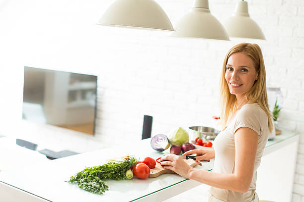 istock Young woman in the kitchen 533453338