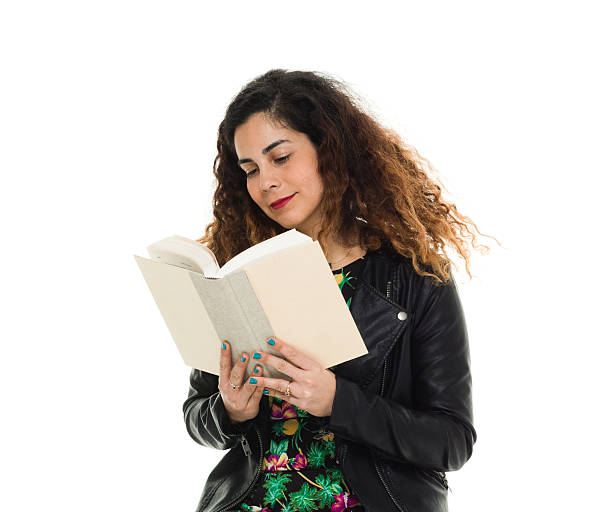 istock Smiling woman reading  book 533454360
