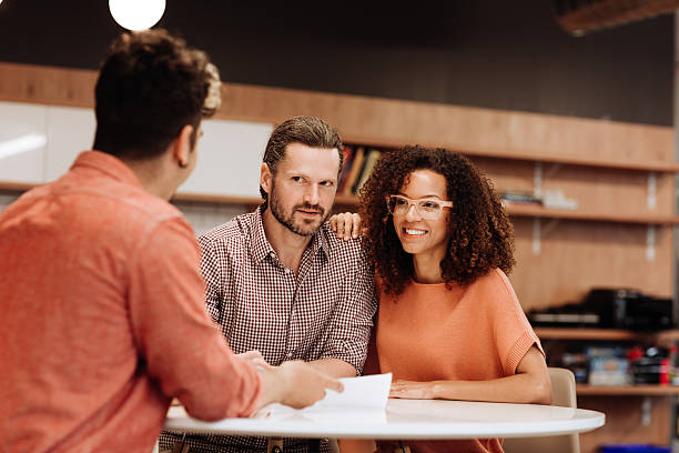 istock Couple with financial advisor 533455630