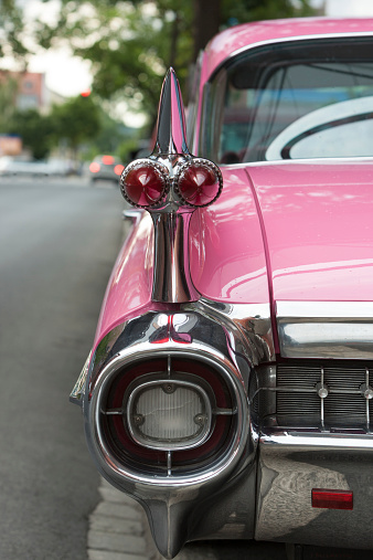 Bamberg, Bavaria, Germany - July 7, 2009: Detail shot of an american classic car pink Cadillac Sedan de Ville 1959 