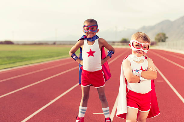 istock Young Child Superhero Team Stands on Track 533462179