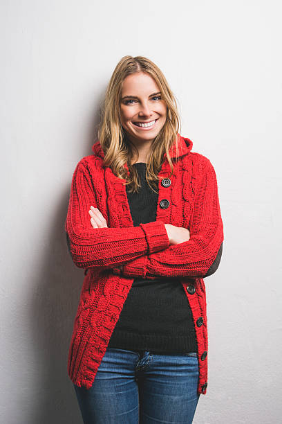 istock Young woman posing against the wall 533464321