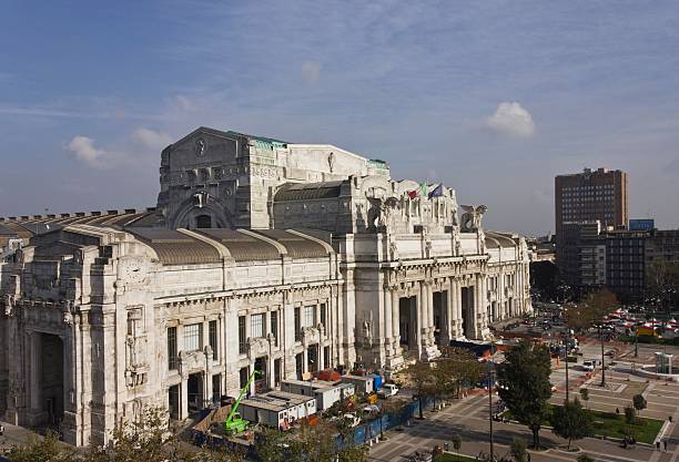 Milan, Italy - June 7, 2012: People at Central Station (aka Milano Centrale). Milano Centrale is the main railway station of Milan and one of the main railway stations in Europe. It was opened in 1931 and serves national and international routes in Milan, Italy on June 07, 2012.
