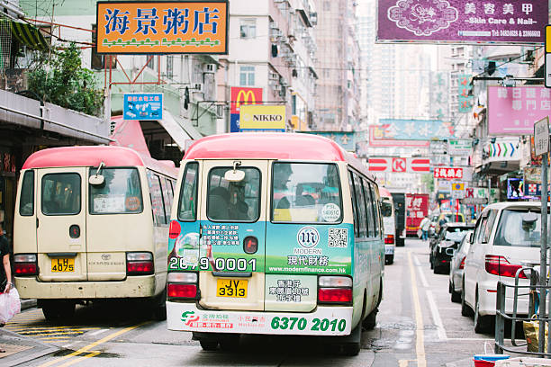 Public light minibuses on Bute Street, Mong Kok, Kowloon, Hong Kong. 