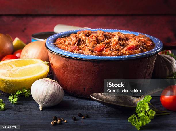 Tomato Sauce With Tuna Fish In Old Pot Spoon Spices Stock Photo - Download Image Now