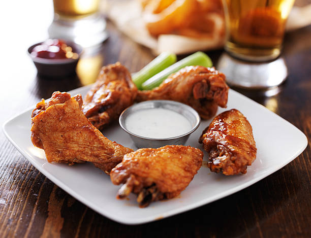 istock hot bbq buffalo chicken wings with celery and ranch 533478105