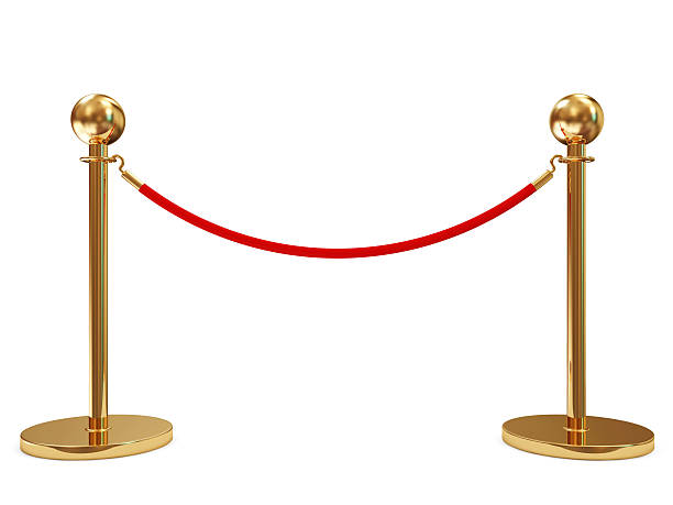 istock Golden Velvet Rope isolated on white background 533479939