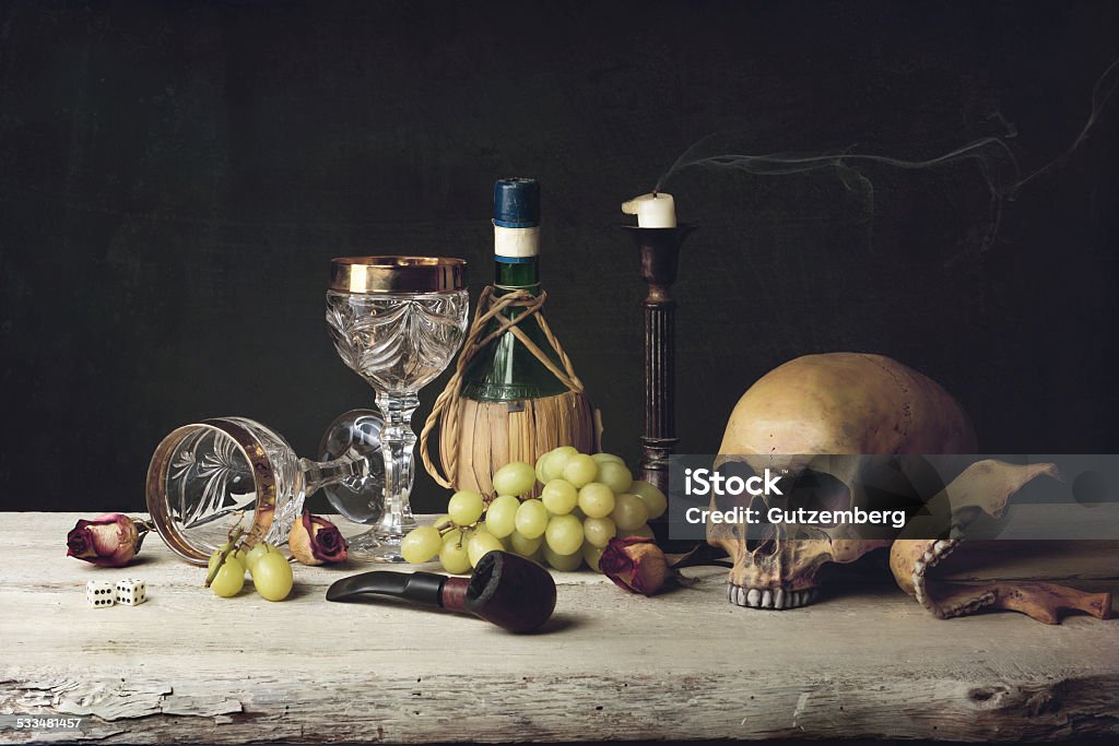 Vanitas with Skull; Pipe, tobacco, dice; wine glass, wine Vanitas with Skull; Pipe, dice; wine glass, wine and grape 2015 Stock Photo