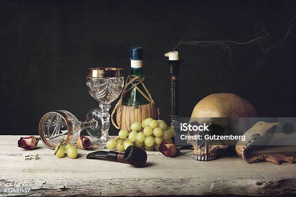 Vanitas With Skull Pipe Tobacco Dice Wine Glass Wine Stock Photo - Download Image Now