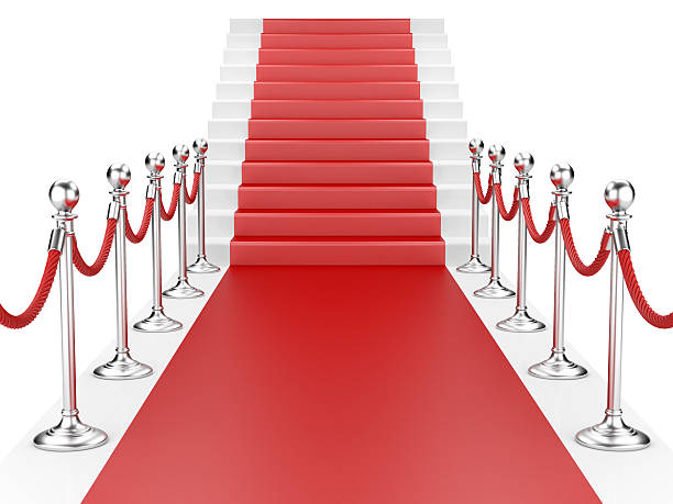 istock Staircase and red carpet between two metallic stanchions with ro 533481785