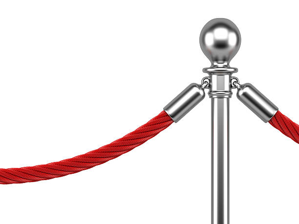 istock closeup metallic stanchions with rope 533481787