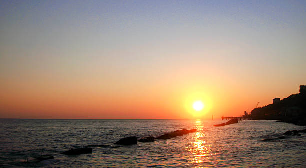 istock Sunset over summer sea with a small waves 533500249